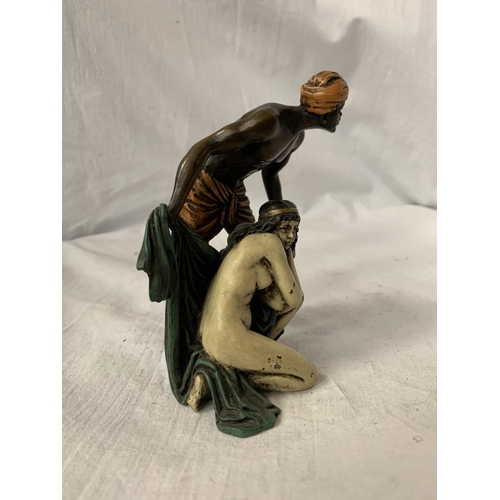 18 - A BERGMAN STYLE COLD PAINTED BRONZE OF A NATIVE AND A GIRL HEIGHT APPROXIMATELY 12.5CM