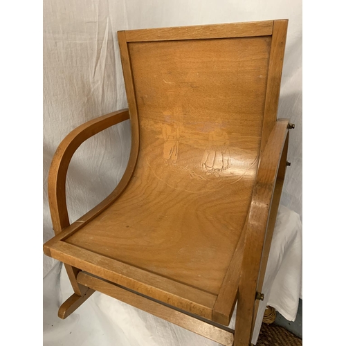 50 - A CHILD'S WOODEN SCANDINAVIAN STYLE ROCKING CHAIR