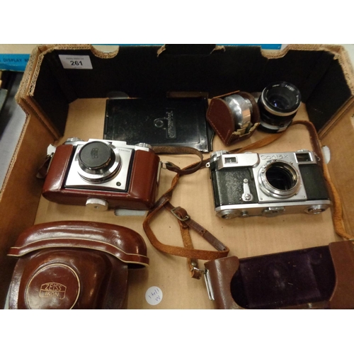 261 - FOUR CAMERAS TO INCLUDE A PENTAX, A ZEISS ICON, A MAMIYA AND A CONTAX INCLUDING CASES AND LENSES