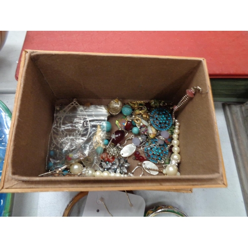 264 - A BOX OF COSTUME JEWELLERY