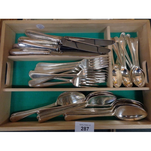 287 - AN EIGHT PLACE FLATWARE SETTING BY WALKER AND HALL, SHEFFIELD TO INCLUDE A MOTHER OF PEARL HANDLE SP... 