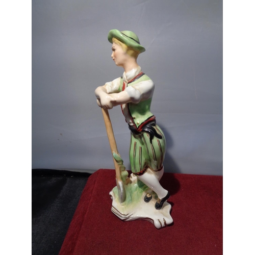 729 - A WEDGWOOD FIGURINE OF A GARDNER