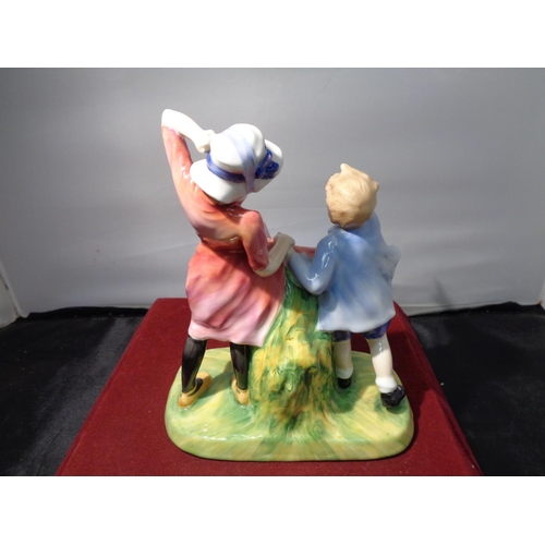 740 - A ROYAL DOULTON FIGURINE MILESTONE