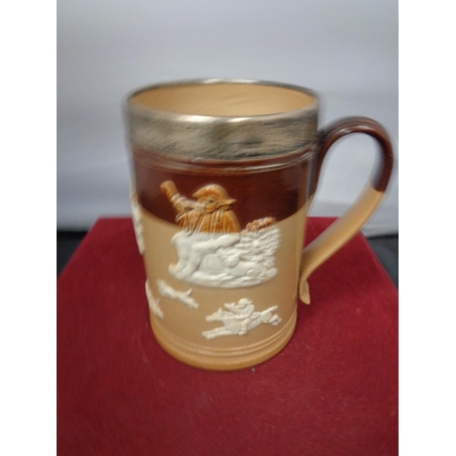 763 - A LAMBETH WARE TANKARD WITH A HALLMARKED LONDON SILVER RIM