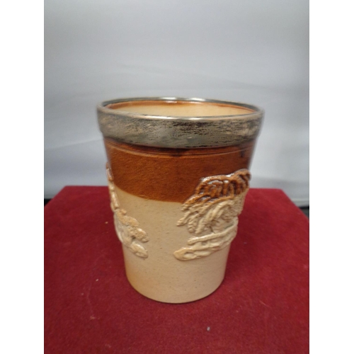 765 - A LAMBETH WARE BEAKER WITH A HALLMARKED  SHEFFIELD SILVER TOP