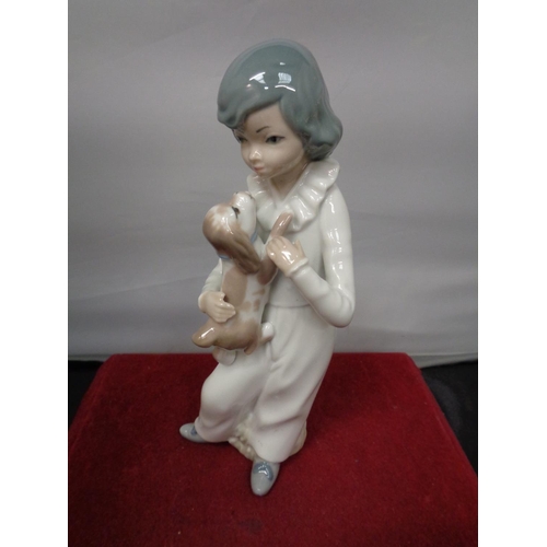 769 - TWO NAO FIGURINES  OF A LITTLE GIRL WITH A PUPPY AND A BOY