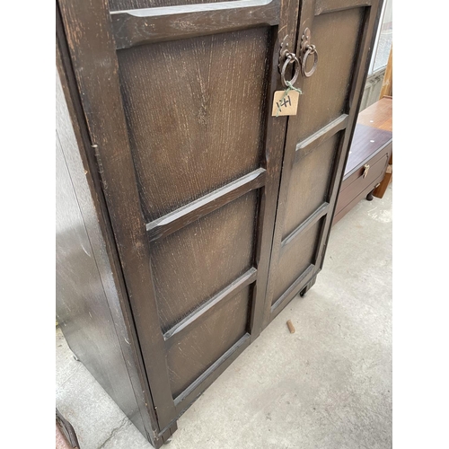 2014 - AN OAK 'D.M.ETCHWORTH' TWO DOOR WARDROBE WITH LINEN FOLD PANELS