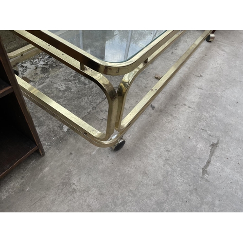 2020 - A MODERN BRASS FRAMED COFFEE TABLE WITH GLASS TOP, 54X24