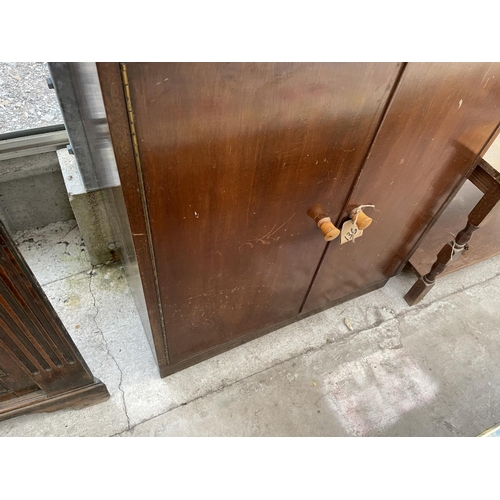 2031 - A RETRO MAHOGANY BUREAU WITH TWO DOORS TO THE BASE, 27