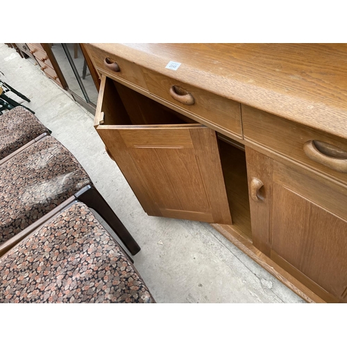 2048 - A RETRO ERCOL STYLE SIDEBOARD WITH SINGLE AND BI-FOLD DOORS AND THREE DRAWERS TO THE BASE AND A PLAT... 