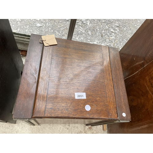 2051 - AN EARLY 20TH CENTURY OAK STICK/COAL BOX WITH APPLIED METALWARE DECORATION