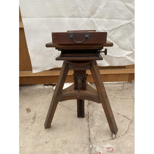 1207 - A VINTAGE WOODEN CAMERA TRIPOD