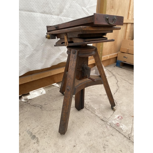 1207 - A VINTAGE WOODEN CAMERA TRIPOD