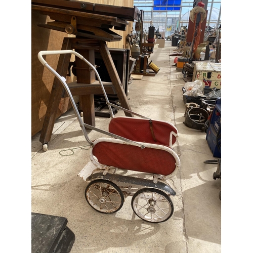 1208 - A VINTAGE CHILDRENS PUSH CHAIR