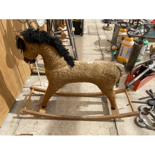 1216 - A VINTAGE CHILDRENS ROCKING HORSE