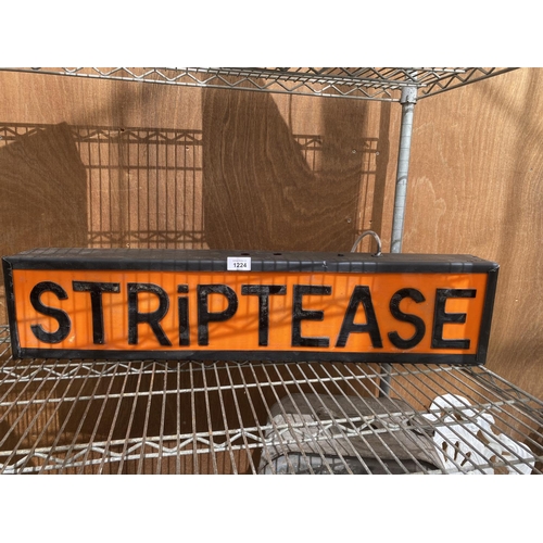 1224 - AN ILLUMINATED 'STRIPTEASE' SIGN