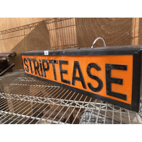 1224 - AN ILLUMINATED 'STRIPTEASE' SIGN