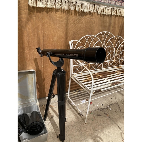 1233 - AN ASSORTMENT OF ITEMS TO INCLUDE A TASCO TELESCOPE, A CAMERA TRIPOD AND FURTHER PHOTOGRAPHY ITEMS E... 