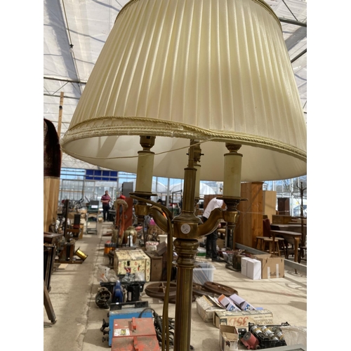 1291 - A MODERN GLASS TOPPED TWO TIER TABLE AND A GILT STANDARD LAMP