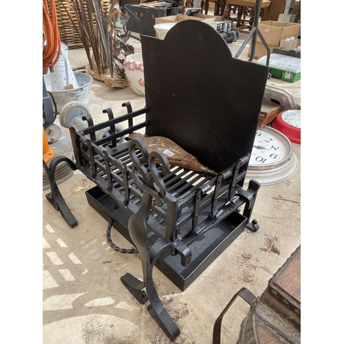 1300 - A LARGE CAST IRON FIRE GRATE WITH FIRE DOGS AND BELLOWS