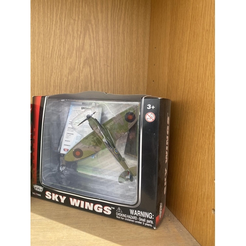 1335 - A QUANTITY OF XBOX 360 GAMES, A PARTY BOARD GAME AND A SKY WINGS MODEL