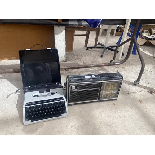 1364 - A SILVER REED TYPE WRITER AND A GRUNDIG CONCERT-BOY 1100 RADIO