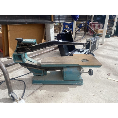 1365 - AN ELECTRIC SCROLL SAW BELIEVED IN WORKING ORDER BUT NO WARRANTY