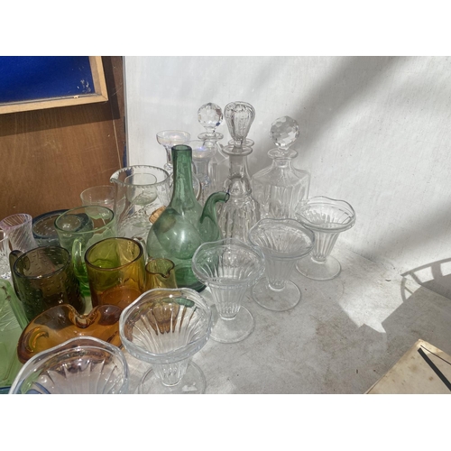 1368 - A LARGE ASSORTMENT OF GLASSWARE TO INCLUDE SUNDAE GLASSES, PAPER WEIGHTS AND DECANTORS ETC