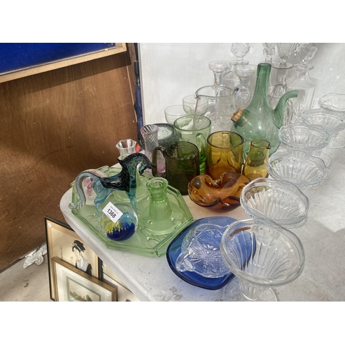 1368 - A LARGE ASSORTMENT OF GLASSWARE TO INCLUDE SUNDAE GLASSES, PAPER WEIGHTS AND DECANTORS ETC