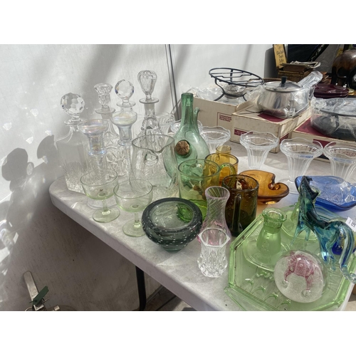 1368 - A LARGE ASSORTMENT OF GLASSWARE TO INCLUDE SUNDAE GLASSES, PAPER WEIGHTS AND DECANTORS ETC