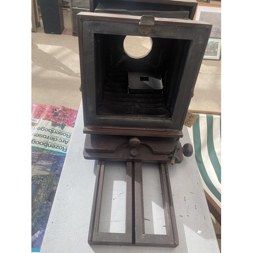 1374 - A VINTAGE WOODEN CAMERA