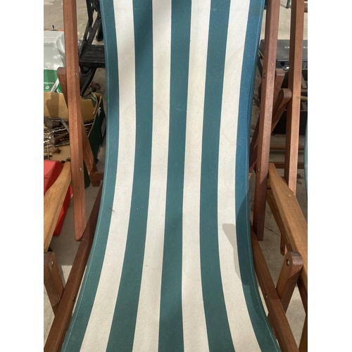 1400 - A PAIR OF WOODEN FRAMED DECK CHAIRS