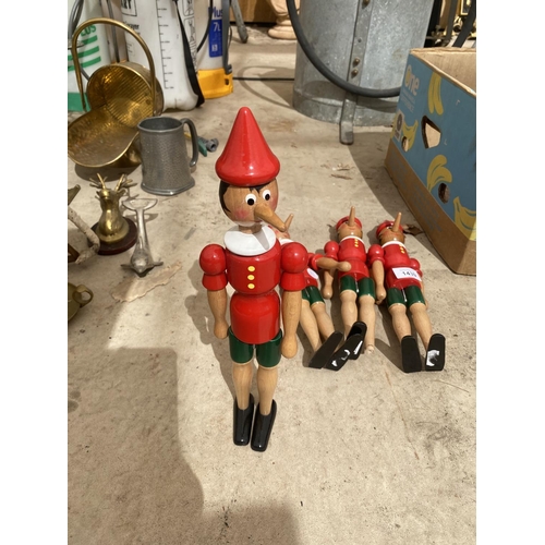 1439 - FOUR WOODEN ELF FIGURES