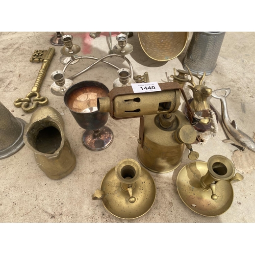 1440 - AN ASSORTMENT OF BRASS WARE TO INCLUDE LARGE KEYS, A BLOW TORCH AND CANDLE HOLDERS ETC