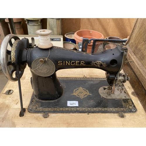 1471 - A SINGER TREADLE SEWING MACHINE AND A FURTHER VINTAGE SINGER SEWING MACHINE