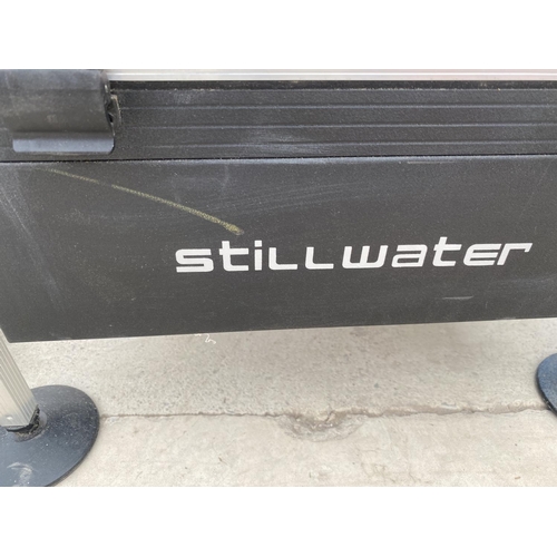 1510 - A STILLWATER TACKLE BOX AND SEAT WITH REALS, FLOATS BAIT SLINGERS ETC