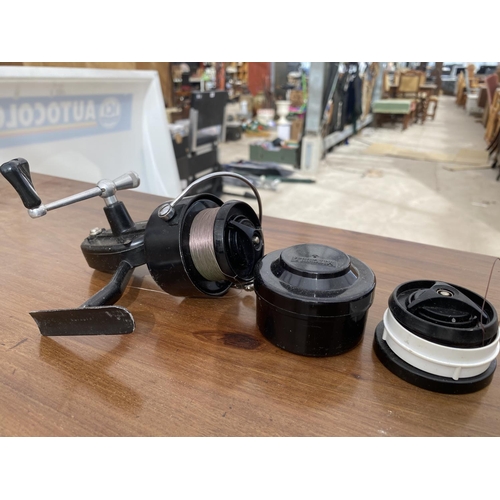 1529 - A GARCIA MITCHELL 300 FISHING REEL AND 2 SPARE SPOOLS