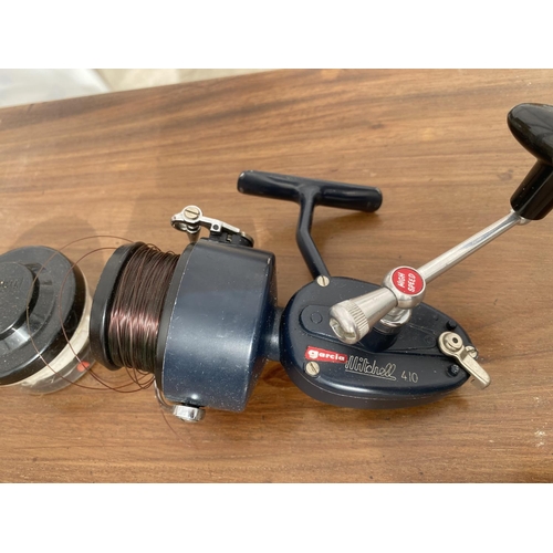 1530 - A GARCIA MITCHELL 410 FISHING REEL AND TWO SPARE SPOOLS