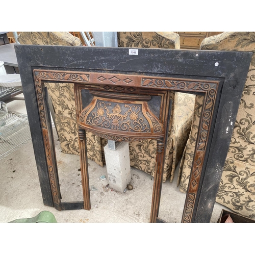 1549 - A DECORATIVE CAST IRON FIRE SURROUND