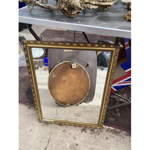 1569 - AN ASSORTMENT OF MIRRORS TO INCLUDE A GILT FRAMED MIRROR AND AN UNFRAMED BEVELED EDGE MIRROR