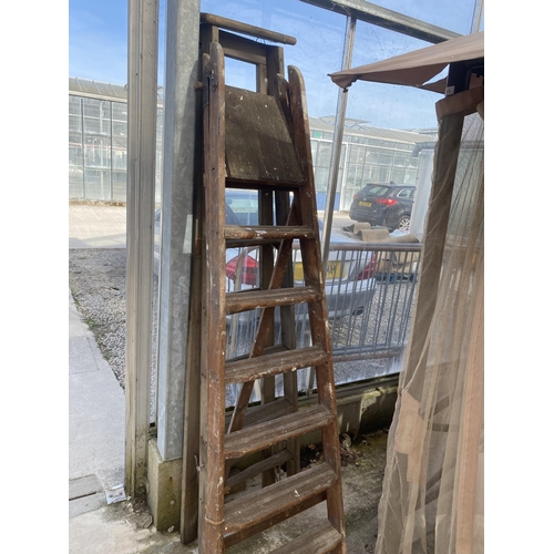 1571 - A VINTAGE 6 RUNG WOODEN STEP LADDER AND A FURTHER 7 RUNG WOODEN STEP LADDER