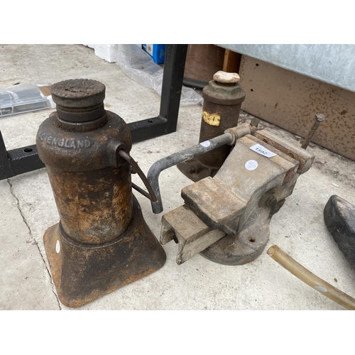 1592 - TWO VINTAGE BOTTLE JACKS AND A VINTAGE BENCH VICE