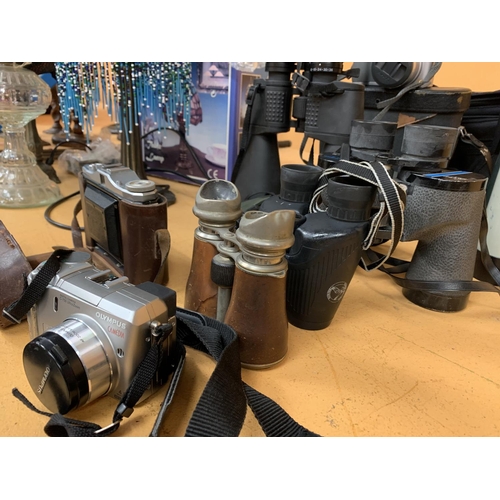 123 - FIVE PAIRS OF BINOCCULARS ONE BEING A VINTAGE LEATHERED EXAMPLE, A VINTAGE NETTAR CAMERA, A PANASONI... 