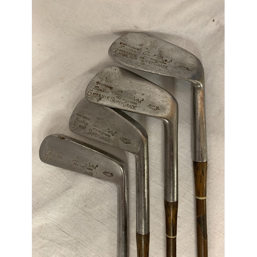 125 - FOUR VINTAGE GOLF CLUBS