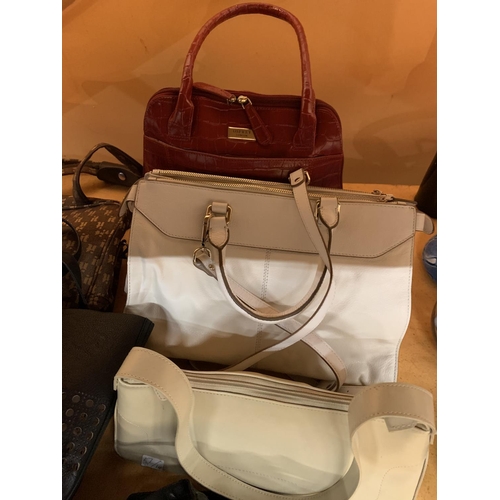 135 - A COLLECTION OF DESIGNER HANDBAGS TO INCLUDE   PRADA, OSPREY, RALPH LAUREN ETC