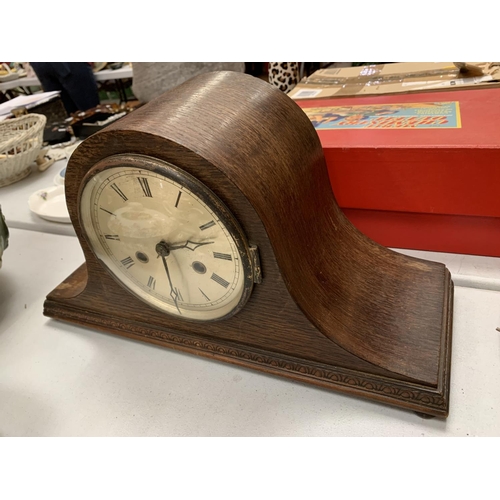 146 - A MAHOGANY NAPOLEON'S HAT MANTEL CLOCK