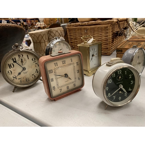 159 - A SELECTION OF EIGHT ALARM CLOCKS AND A CARRIAGE CLOCK