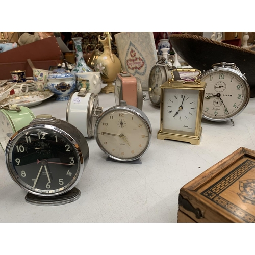 159 - A SELECTION OF EIGHT ALARM CLOCKS AND A CARRIAGE CLOCK