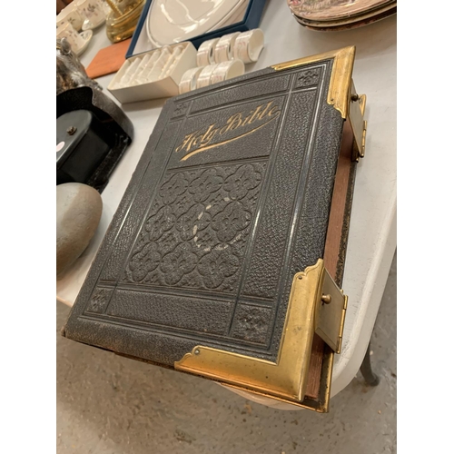 168 - A 19th CENTURY LEATHER AND BRASS BOUND ILLUSTRATED HOLY BIBLE IN VERY CLEAN CONDITION  TO INCLUDE IN... 