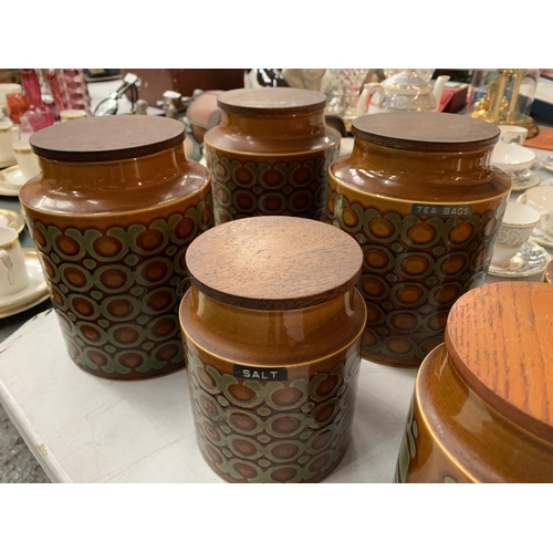 174 - A COLLECTION OF EIGHT HORNSEA STORAGE JARS WITH LIDS